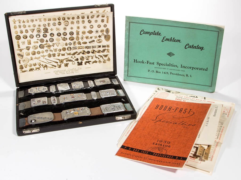 NATIONAL CRAFTS CO. / HOOK-FAST SPECIALTIES SALESMAN'S: NATIONAL CRAFTS CO. / HOOK-FAST SPECIALTIES SALESMAN'S SAMPLE KIT, comprising a case with sample belt buckles including Shell Oil, two catalogs, and assorted ephemera. Second quarter 20th century. Cas