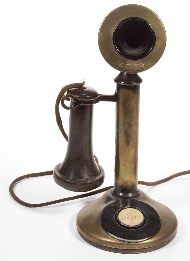 WESTERN ELECTRIC CANDLESTICK PHONE: WESTERN ELECTRIC CANDLESTICK PHONE, with numerous patent dates, including "Jan. 14, 1913". Retains original components. Circa 1920. 11 3/4" HOA. Provenance: Property of a Virginia private collector.