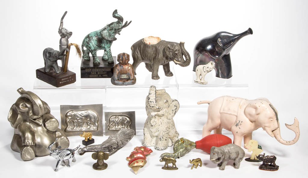 ASSORTED FIGURAL ELEPHANT ARTICLES, LOT OF 23: ASSORTED FIGURAL ELEPHANT ARTICLES, LOT OF 23, including three penny banks and a bottle opener. 20th century. 5 1/2" HOA. Provenance: From the Dorothy R. Daniel estate, Arlington, VA.