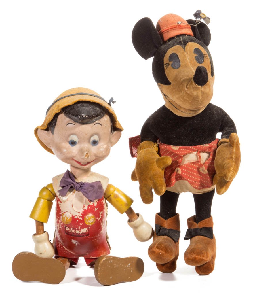 WALT DISNEY CHARACTER DOLLS, LOT OF TWO: WALT DISNEY CHARACTER DOLLS, LOT OF TWO, comprising a felt Minnie Mouse and a jointed composition and wood Ideal Pinocchio. Second quarter 20th century. 12" and 10 1/2" H. Provenance: Property of a Vi