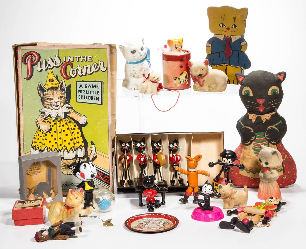 ASSORTED CAT THEME TOYS, LOT OF 24: ASSORTED CAT THEME TOYS, LOT OF 24, including a wooden five-piece band, Felix popup, "Puss in the Corner" game, etc. 20th century. Various sizes. Provenance: From the Dorothy R. Daniel estate, Arlingt