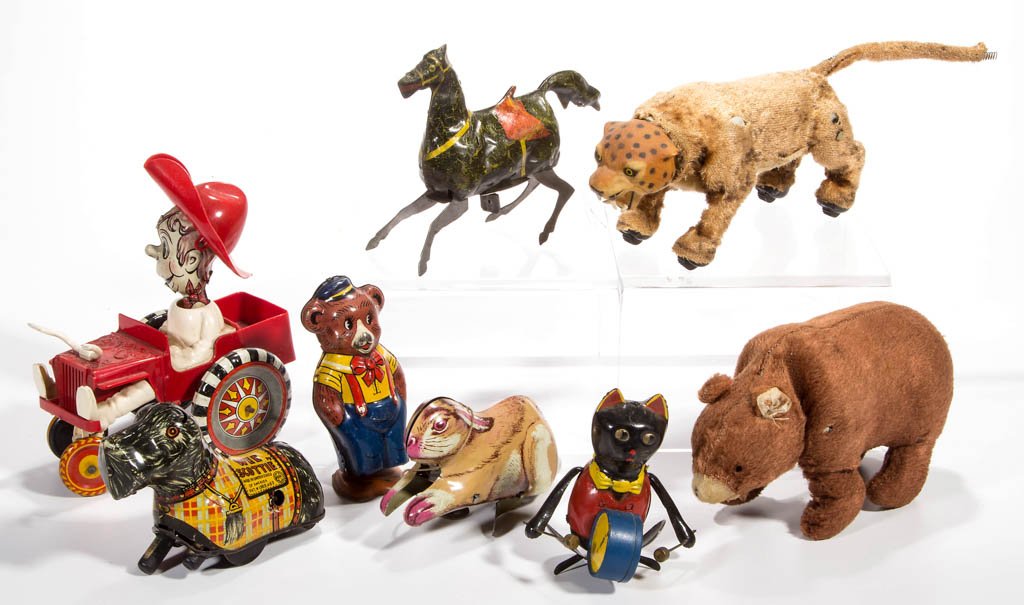 ASSORTED VINTAGE WIND-UP TOYS, LOT OF EIGHT: ASSORTED VINTAGE WIND-UP TOYS, LOT OF EIGHT, including Marx Cowboy Whoopee Car, Wee Scottie, and Tiger. First half 20th century. 3" to 6 1/2" H. Provenance: Property of a Virginia private collector.