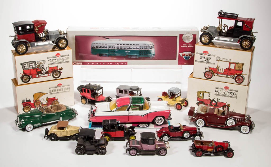 ASSORTED DIE-CAST TOY VEHICLES, LOT OF 17: ASSORTED DIE-CAST TOY VEHICLES, LOT OF 17, including a Corgi Vintage Bus Lines 1:50 scale with box, other Corgi, Ziss, J.M.K, and Franklin Mint. 20th century. 3" to 11" L. Provenance: From the Dorothy