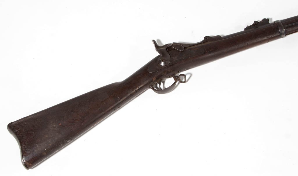 U.S. SPRINGFIELD MODEL 1884 ROLLING BLOCK RIFLE: U.S. SPRINGFIELD MODEL 1884 ROLLING BLOCK RIFLE, .45-70 caliber, serial number 322631, marked to lockplate "U.S. / SPRINGFIELD" with eagle. 1886. 32 1/2" barrel, 52 1/4" OA. Provenance: Property of a 
