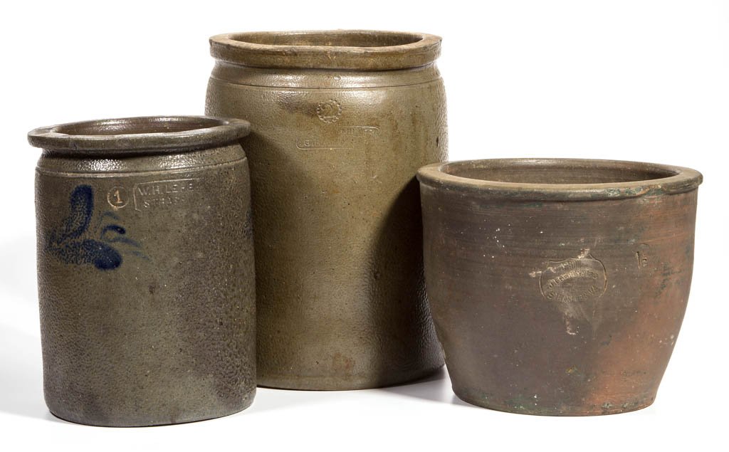 ASSORTED STAMPED STRASBURG, VIRGINIA STONEWARE CROCKS,: ASSORTED STAMPED STRASBURG, VIRGINIA STONEWARE CROCKS, LOT OF THREE, salt-glazed, comprising an undecorated "2" gallon jar stamped "Geo. Miller", an undecorated "1 1/2" gallon crock stamped "J. Eberly