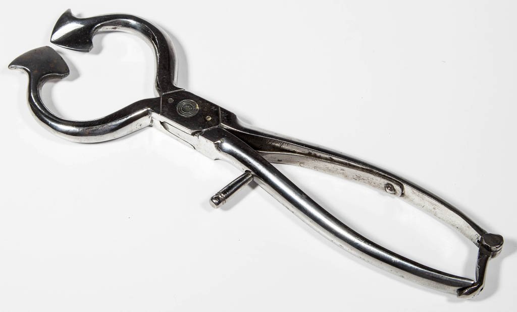 POLISHED STEEL SUGAR NIPPERS: POLISHED STEEL SUGAR NIPPERS, decorative work at swivel joint, original lock clasp, no markings located. Mid 19th century. 9" L. Provenance: From a New England private collection.