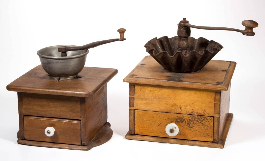 AMERICAN BOX-STYLE COFFEE GRINDERS, LOT OF TWO: AMERICAN BOX-STYLE COFFEE GRINDERS, LOT OF TWO, each with a dovetailed case and single drawer, pewter and crimped sheet-iron hoppers. First half 19th century. 5" and 5 1/2" H cases. Provenance: From a