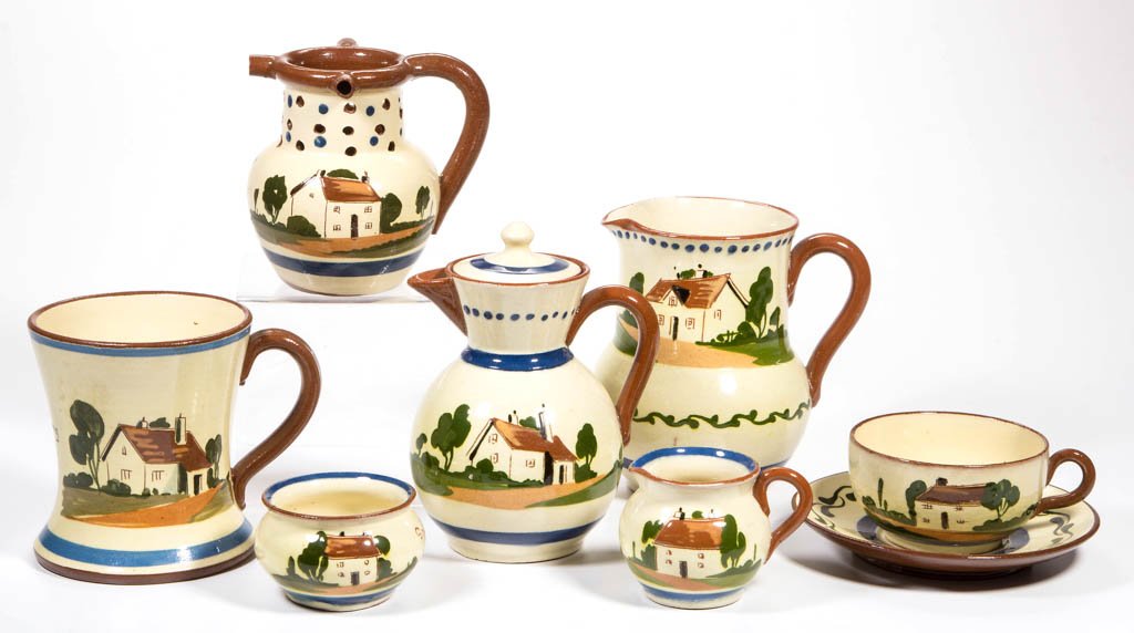 WATCOMBE TORQUAY ENGLAND CERAMIC ARTICLES, LOT OF EIGHT: WATCOMBE TORQUAY ENGLAND CERAMIC ARTICLES, LOT OF EIGHT, each with cottage on one side and motto on reverse, including a puzzle jug and a small pot with cover. Mid 20th century. 1 7/8" to 5 3/8" H. Pr