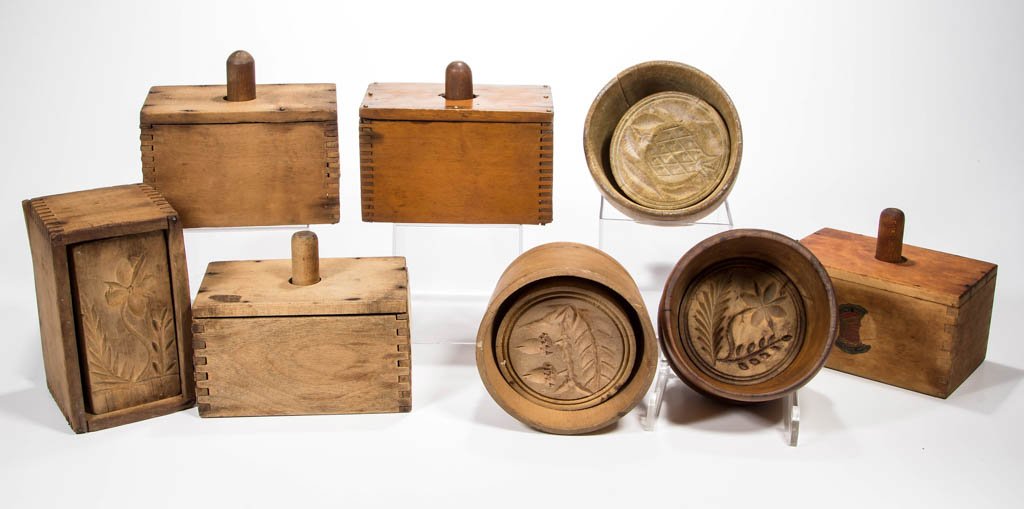 AMERICAN TREEN BUTTER MOLDS, LOT OF EIGHT: AMERICAN TREEN BUTTER MOLDS, LOT OF EIGHT, comprising three round with flower, acorn, and pineapple stamps, and five rectangular, three plain and two with design. Late 19th/first quarter 20th century.