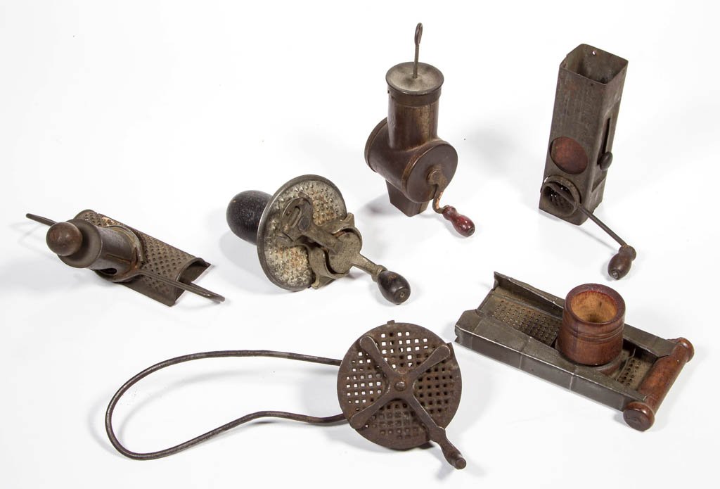 ASSORTED SHEET-IRON AND CAST-IRON NUTMEG GRATERS, LOT: ASSORTED SHEET-IRON AND CAST-IRON NUTMEG GRATERS, LOT OF SIX, comprising four hand-crank examples, including a vertical example marked "MTE", another with impressed patent date "PATENT DEC 25. 77", an