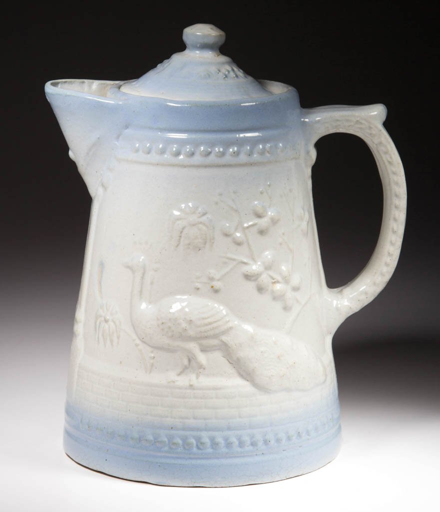 RARE BLUE AND WHITE SALT-GLAZED CERAMIC COFFEE POT WITH: RARE BLUE AND WHITE SALT-GLAZED CERAMIC COFFEE POT WITH COVER, Peacock pattern. First quarter 20th century. 8" H rim, 9 1/8" HOA. Literature: Taylor/Lowrance - Salt Glaze Stoneware, pp. 65, 66. Proven