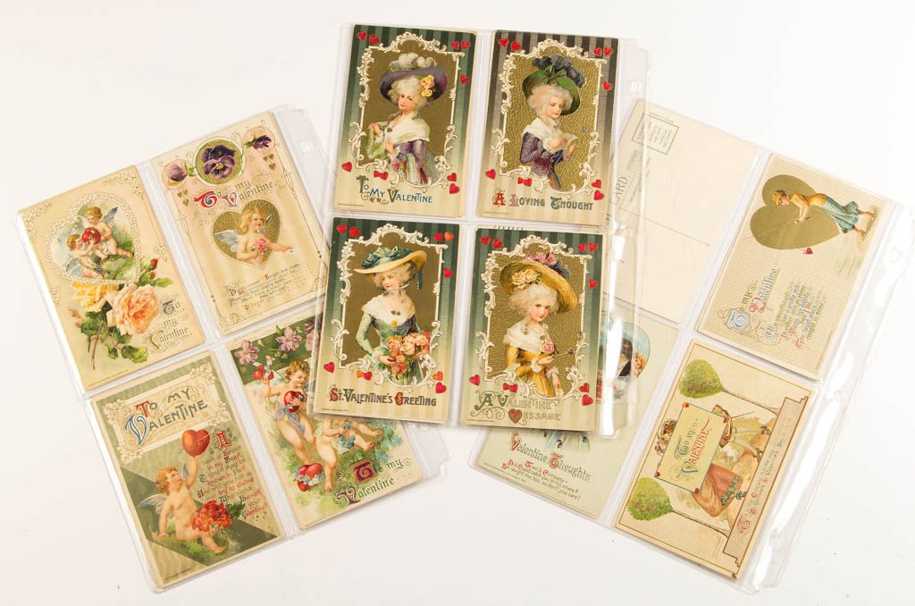 JOHN WINSCH VALENTINE'S DAY POST CARDS, LOT OF 23: JOHN WINSCH VALENTINE'S DAY POST CARDS, LOT OF 23, marked to face "Design Copyrighted, John Winsch", featuring cherubs, young ladies, and children. Embossed, some unused. First quarter 20th century. P