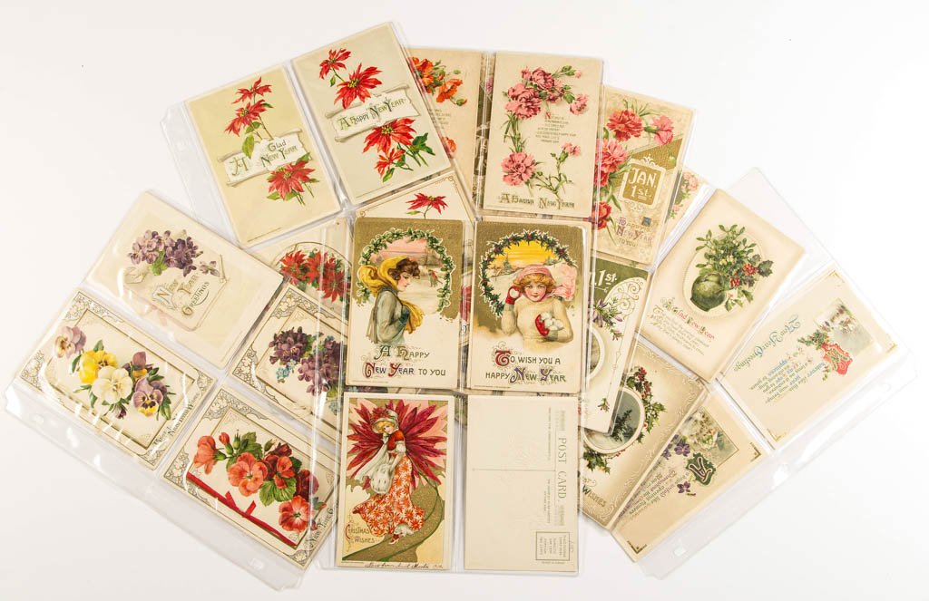 JOHN WINSCH EMBOSSED NEW YEARS POST CARDS, LOT OF 49: JOHN WINSCH EMBOSSED NEW YEARS POST CARDS, LOT OF 49, each marked to face "Copyright John Winsch", including ten booklet examples, and three featuring Schmucker-style girls. Some unused. First quarter