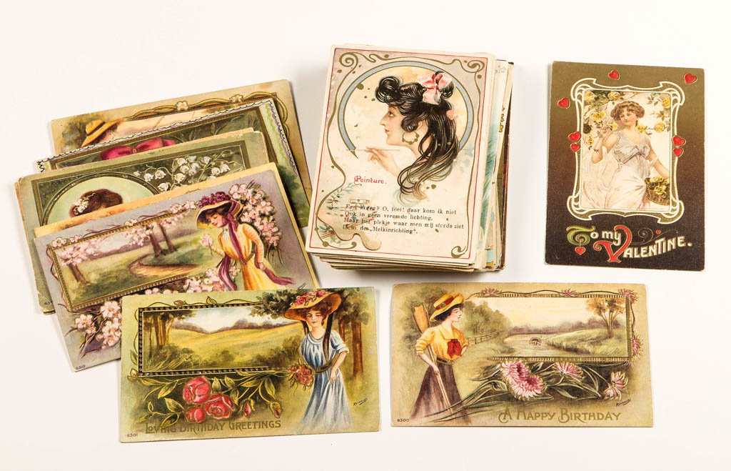 ASSORTED GREETINGS / HOLIDAY POST CARDS, LOT OF 56: ASSORTED GREETINGS / HOLIDAY POST CARDS, LOT OF 56, featuring beautiful ladies, some artist-signed examples including Reynolds and Dixon, many Art Nouveau and Arts & Crafts designs. Many examples embo