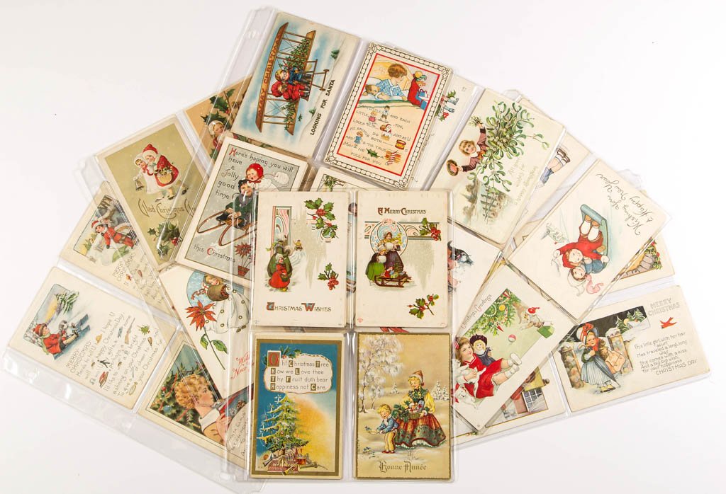 EMBOSSED CHRISTMAS POST CARDS, LOT OF 55: EMBOSSED CHRISTMAS POST CARDS, LOT OF 55, including three unsigned Grace Drayton "Campbell Kids" style examples. Featuring children enjoying the holiday. Some unused. First quarter 20th century. Prove