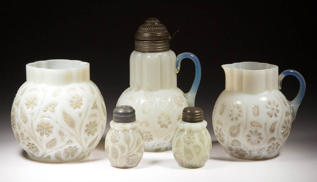 FINDLAY ONYX ARTICLES, LOT OF FIVE: FINDLAY ONYX ARTICLES, LOT OF FIVE, ivory onyx with platinum flowers, comprising a syrup pitcher, celery vase with reduced rim, creamer, and a salt and pepper shaker. Dalzell, Gilmore & Leighton Co., 