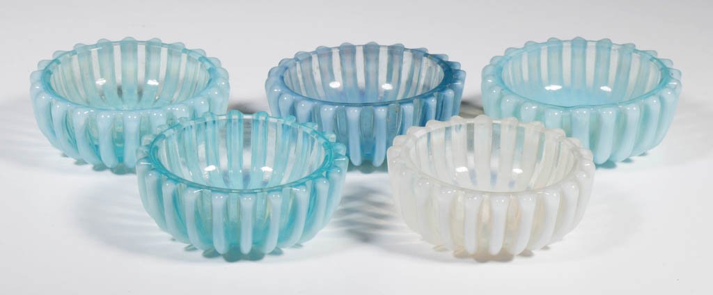 BEATTY RIB OPEN SALTS, LOT OF FIVE: BEATTY RIB OPEN SALTS, LOT OF FIVE, colorless and blue opalescent. A. J. Beatty & Sons. Circa 1889. 1 7/8" D. Literature: Parallels Heacock/Elmore - Opalescent Glass From A-Z, p. 149, fig. 555. Proven