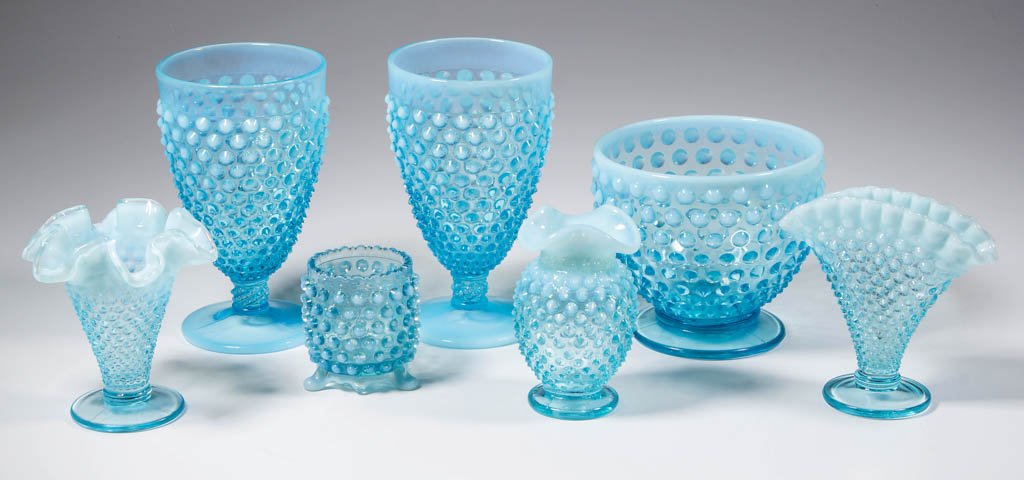 FENTON HOBNAIL ARTICLES, LOT OF SEVEN: FENTON HOBNAIL ARTICLES, LOT OF SEVEN, blue opalescent, including a footed bowl, two goblets, and a toothpick holder. 20th century. 2 3/8" to 5 3/4" H. Literature: Parallels Heacock - Fenton Glass: Th