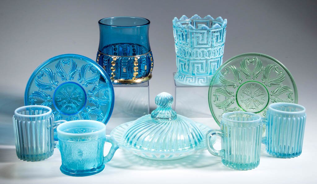 ASSORTED PRESSED ARTICLES, LOT OF NINE: ASSORTED PRESSED ARTICLES, LOT OF NINE, including a Beatty Swirl butter dish, Double Greek Key sugar base, and two Idyll condiment trays. Late 19th/early 20th century. 2 3/4" to 4 1/2" HOA, 4" to 7 3/