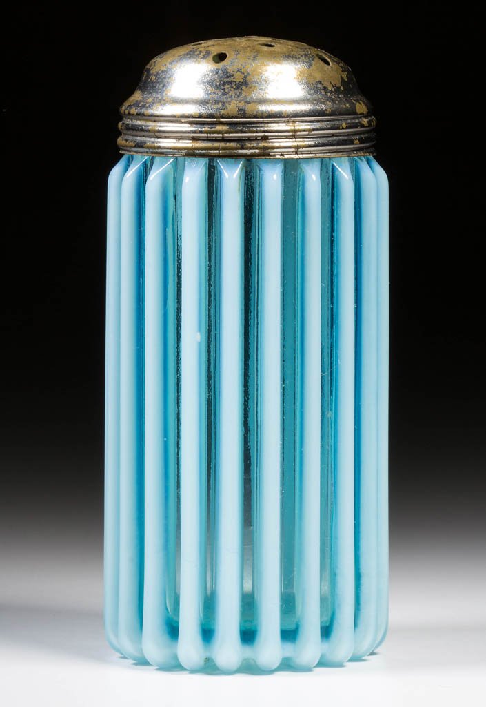 BEATTY RIB SUGAR SHAKER: BEATTY RIB SUGAR SHAKER, blue opalescent, period lid. A. J. Beatty & Sons. Circa 1889. 5" HOA. Literature: Parallels Heacock/Elmore - Opalescent Glass From A-Z, p. 120, fig. 129. Provenance: From the 