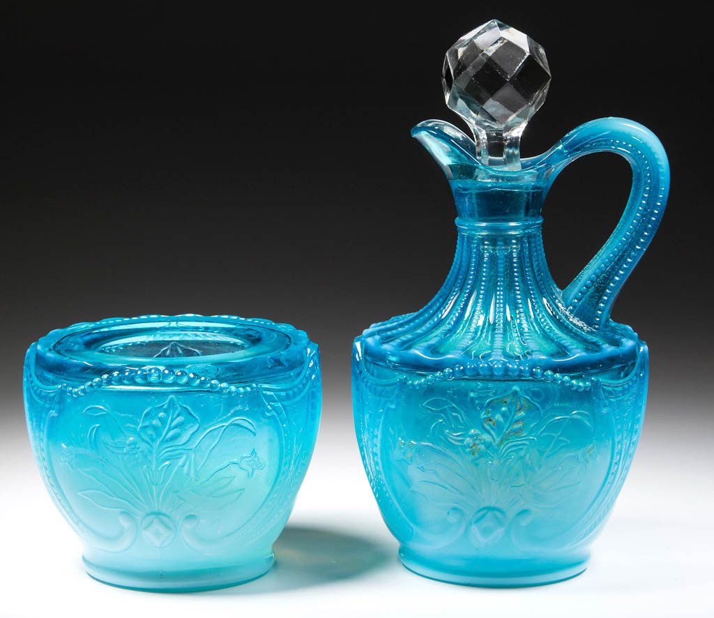 WILD BOUQUET CRUET: WILD BOUQUET CRUET, blue opalescent with traces of painted decoration, facet-cut stopper. Together with a Wild Bouquet vase made from a cruet mold or fashioned from a cruet. Two pieces total. The Nort