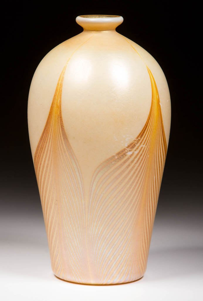 KEW BLAS ART GLASS PULLED FEATHER VASE: KEW BLAS ART GLASS PULLED FEATHER VASE, iridescent with golden Pulled Feather design, polished pontil mark, signed "Kew Blas." Union Glass Co. Late19th/early 20th century. 6 1/8" HOA. Provenance: Prop