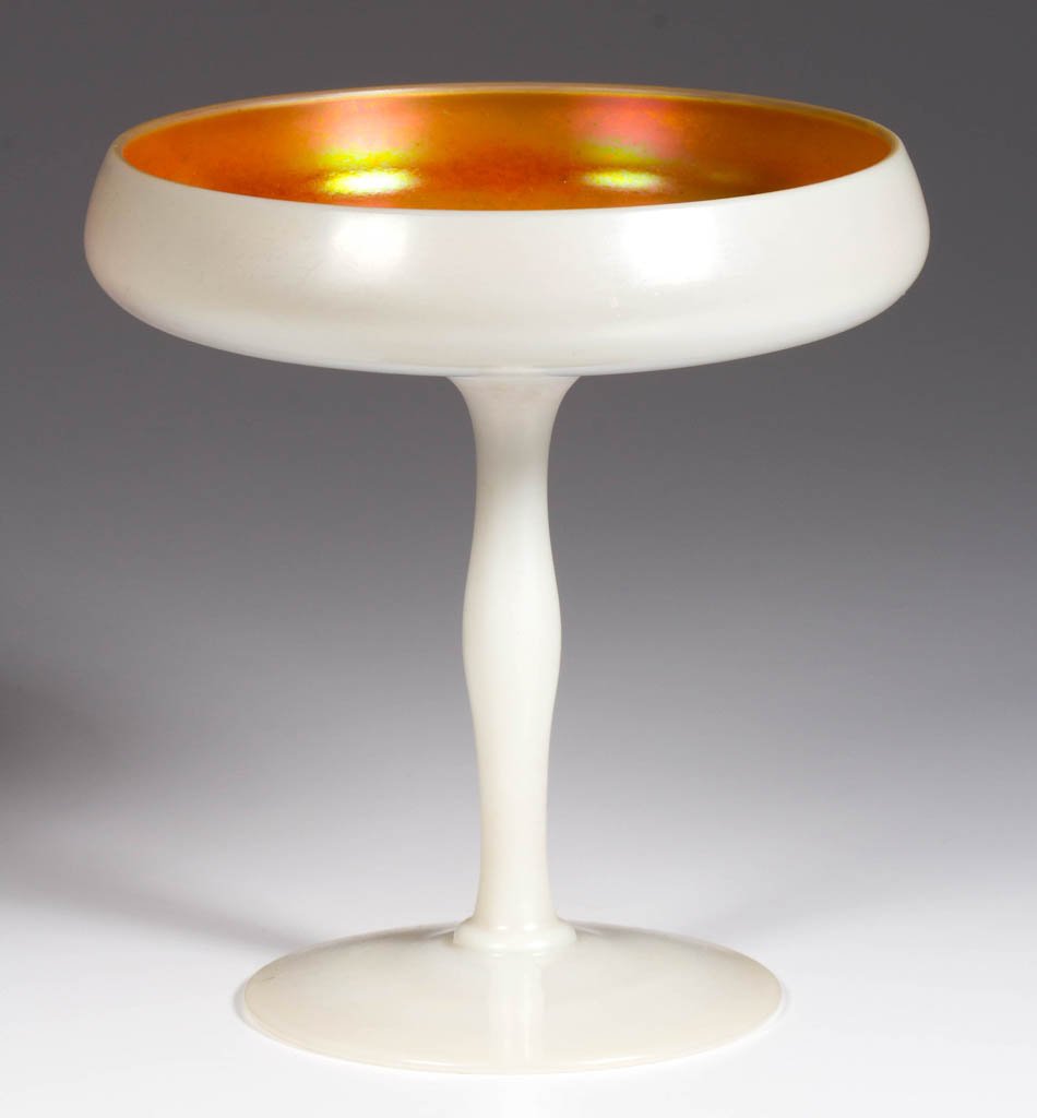 STEUBEN GOLD CALCITE TAZZA: STEUBEN GOLD CALCITE TAZZA, shape 5066, with applied foot and stem, having a polished pontil mark. Steuben Glass Works. First quarter 20th century. 6 1/8" H, 6 1/8" D. Provenance: From the collection 