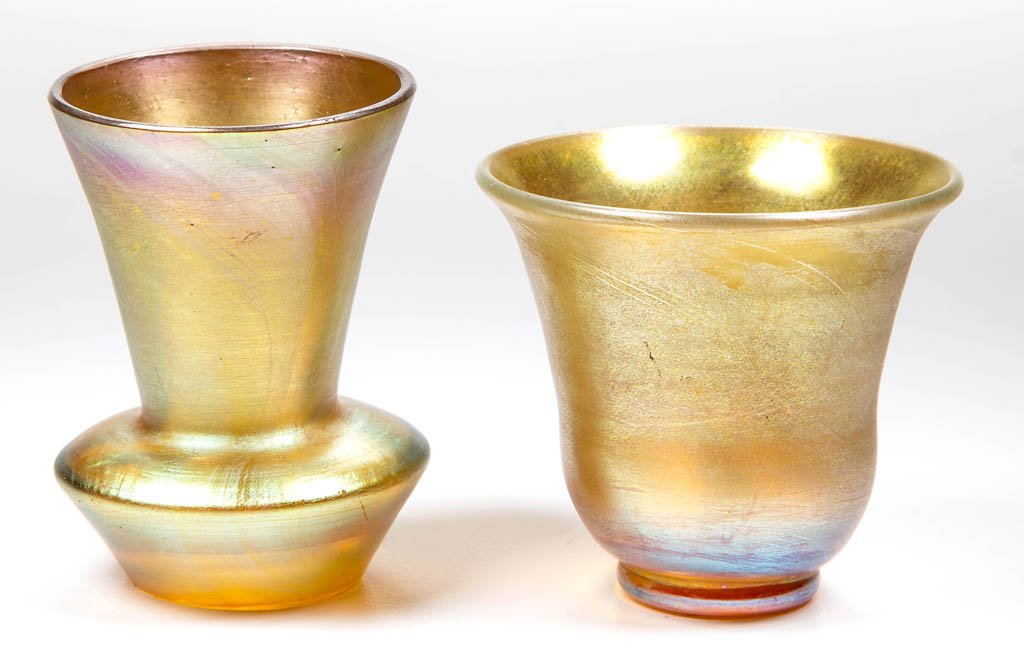 AMERICAN ART GLASS TOOTHPICK HOLDERS, LOT OF TWO: AMERICAN ART GLASS TOOTHPICK HOLDERS, LOT OF TWO, golden iridescent, comprising a squat-base example with trumpeted neck and factory polished rim, urn-form example with spurious "LCT" mark, each with