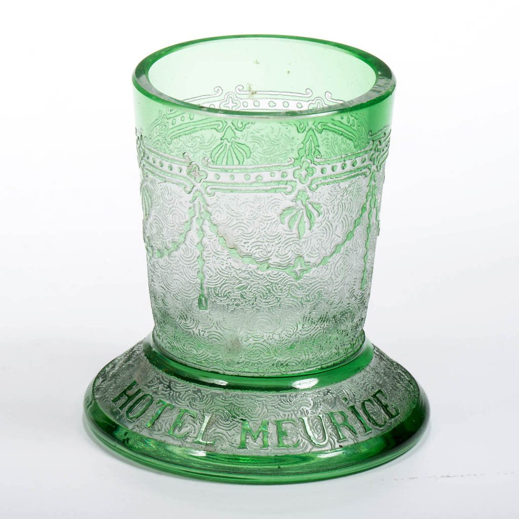 VAL ST. LAMBERT HOTEL MEURICE TOOTHPICK HOLDER: VAL ST. LAMBERT HOTEL MEURICE TOOTHPICK HOLDER, green cut to colorless, factory polished rim and base. Fourth quarter 19th century. 2 1/8" H. Literature: Toothpick Holders: China, Glass and Metal, p.
