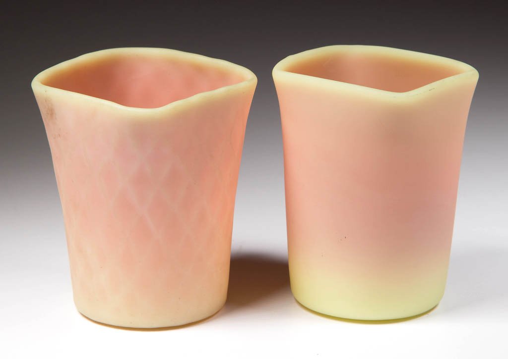 MT. WASHINGTON BURMESE TOOTHPICK HOLDERS, LOT OF TWO: MT. WASHINGTON BURMESE TOOTHPICK HOLDERS, LOT OF TWO, plush finish, square rim, one diamond-quilt example, each with a polished pontil mark. Mt. Washington Glass Co. Circa 1886. 2 3/8" H. Literature: