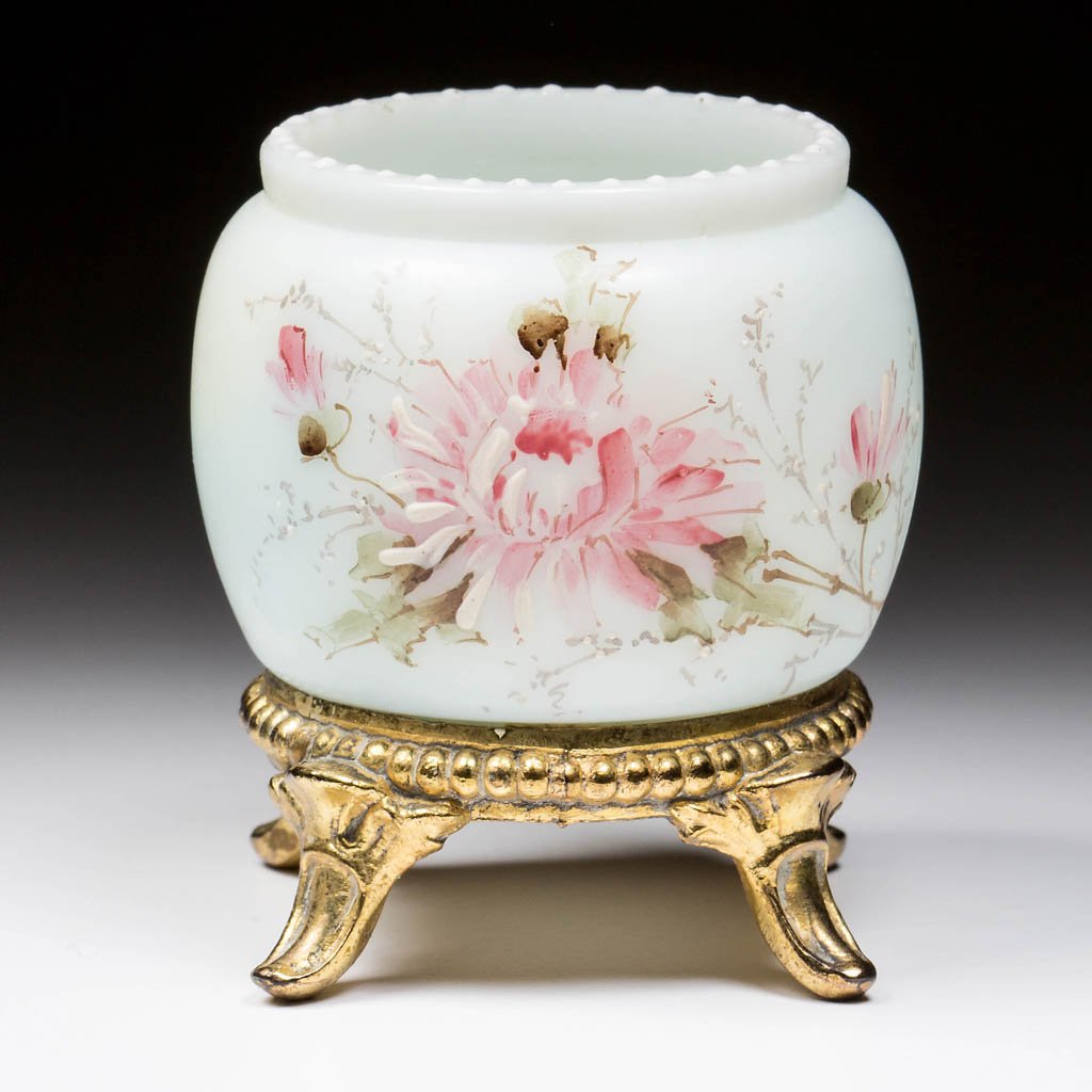 WAVE CREST TOOTHPICK HOLDER: WAVE CREST TOOTHPICK HOLDER, opal with polychrome decoration, beaded rim, gilt-metal stand, signed. C. F. Monroe Co. Circa 1898. 2 1/2" H. Literature: Parallels Bredehoft/Sanford - Glass Toothpick Hol