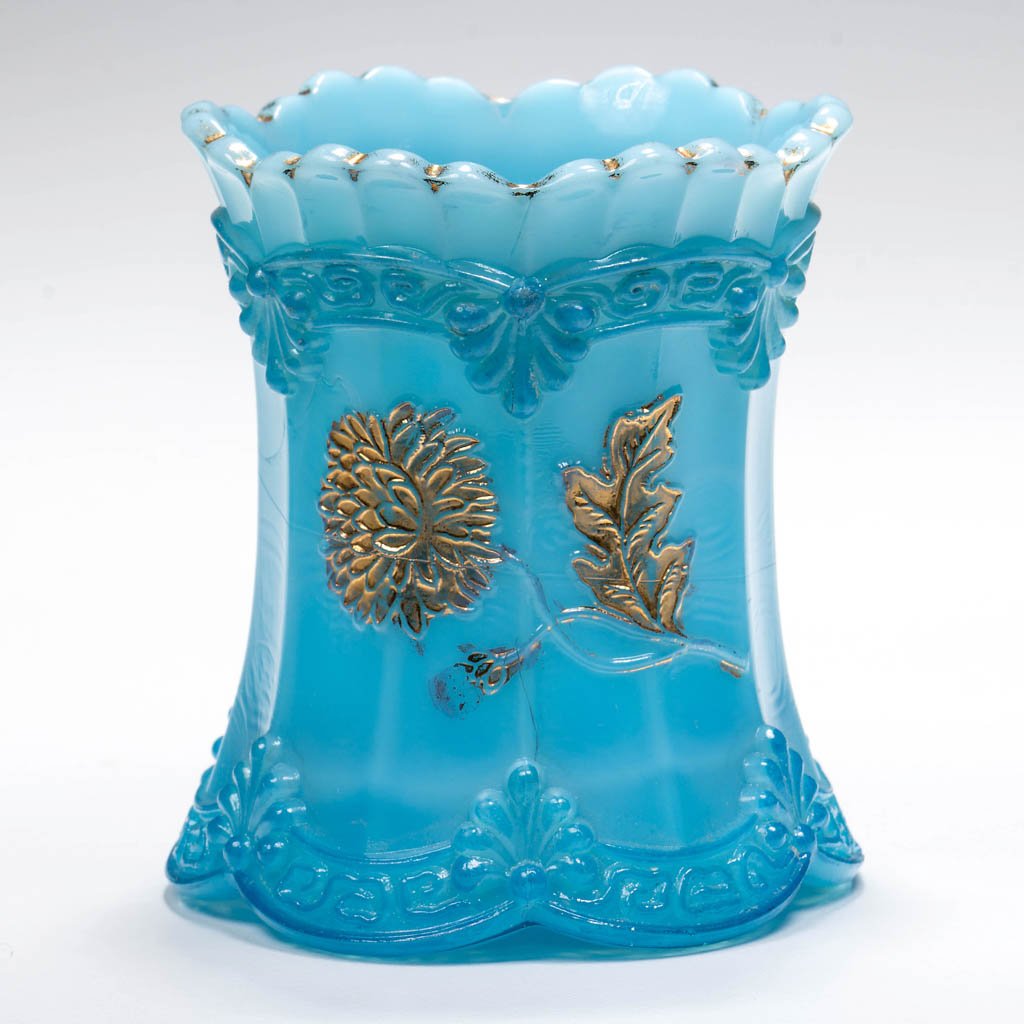 CHRYSANTHEMUM SPRIG / PAGODA (OMN) TOOTHPICK HOLDER: CHRYSANTHEMUM SPRIG / PAGODA (OMN) TOOTHPICK HOLDER, opaque blue with dark blue stain and gilt decoration, base embossed "Northwood". Northwood Glass Co. Circa 1899. 2 3/4" H. Literature: Bredehoft/Sa