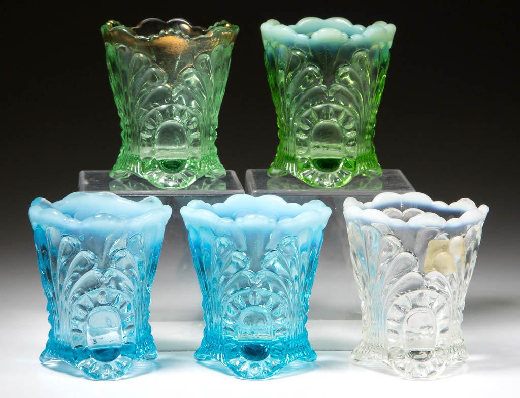 TOKYO / JEFFERSON NO. 212 (OMN) TOOTHPICK HOLDERS, LOT: TOKYO / JEFFERSON NO. 212 (OMN) TOOTHPICK HOLDERS, LOT OF FIVE, colorless, blue, and green opalescent, and one green example with gilt decoration. Jefferson Glass Co. Pattern introduced 1904. 2 3/8" H