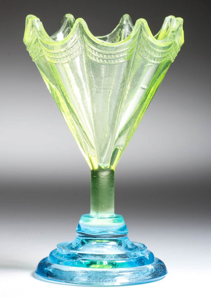 FIGURAL UMBRELLA STAND TOOTHPICK HOLDER: FIGURAL UMBRELLA STAND TOOTHPICK HOLDER, blue and vaseline (uranium). Maker unverified. Late 19th/early 20th century. 4" HOA. Literature: Toothpick Holders: China, Glass and Metal, p. 36, fig. 301. Pr