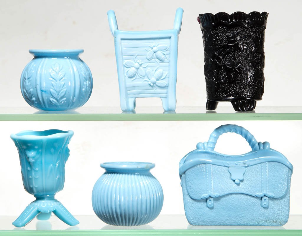 ASSORTED OPAQUE TOOTHPICK HOLDERS, LOT OF SIX: ASSORTED OPAQUE TOOTHPICK HOLDERS, LOT OF SIX, blue and black, including a Bees on Basket, Fine Rib, and Footed Devil example. Late 19th/early 20th century. 2" to 3 1/8" H. Literature: Parallels Tooth