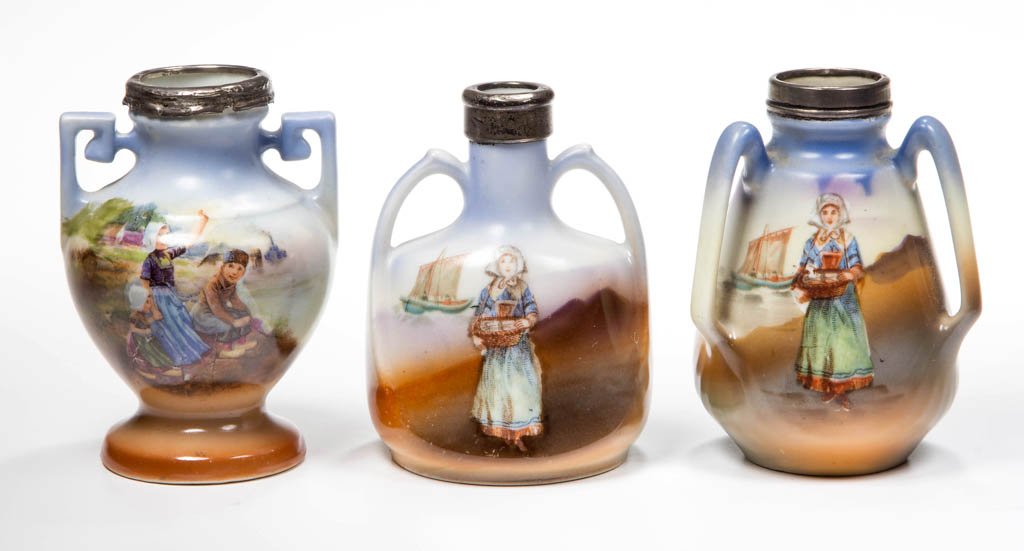 ASSORTED ROYAL BAYREUTH PORCELAIN TOOTHPICK HOLDERS,: ASSORTED ROYAL BAYREUTH PORCELAIN TOOTHPICK HOLDERS, LOT OF THREE, comprising two Brittany Woman and a Dutch Children example, having silver mountings. Each with printed blue mark to underside. Circa