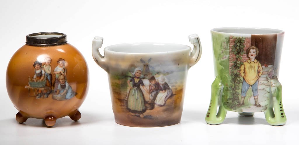 ROYAL BAYREUTH PORCELAIN TOOTHPICK HOLDERS, LOT OF: ROYAL BAYREUTH PORCELAIN TOOTHPICK HOLDERS, LOT OF THREE, comprising a Dutch Children, European Children, and a Jack and the Beanstalk example. Two with printed blue mark to underside. Circa 1900-1920