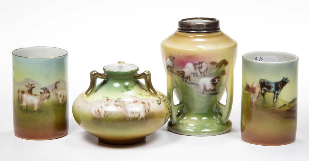 ROYAL BAYREUTH PORCELAIN TOOTHPICK HOLDERS, LOT OF FOUR: ROYAL BAYREUTH PORCELAIN TOOTHPICK HOLDERS, LOT OF FOUR, comprising a Black Bow and three Highland Sheep examples. Three with printed blue mark to underside. Circa 1900-1920. 2 1/8" to 3 1/4" H. Liter