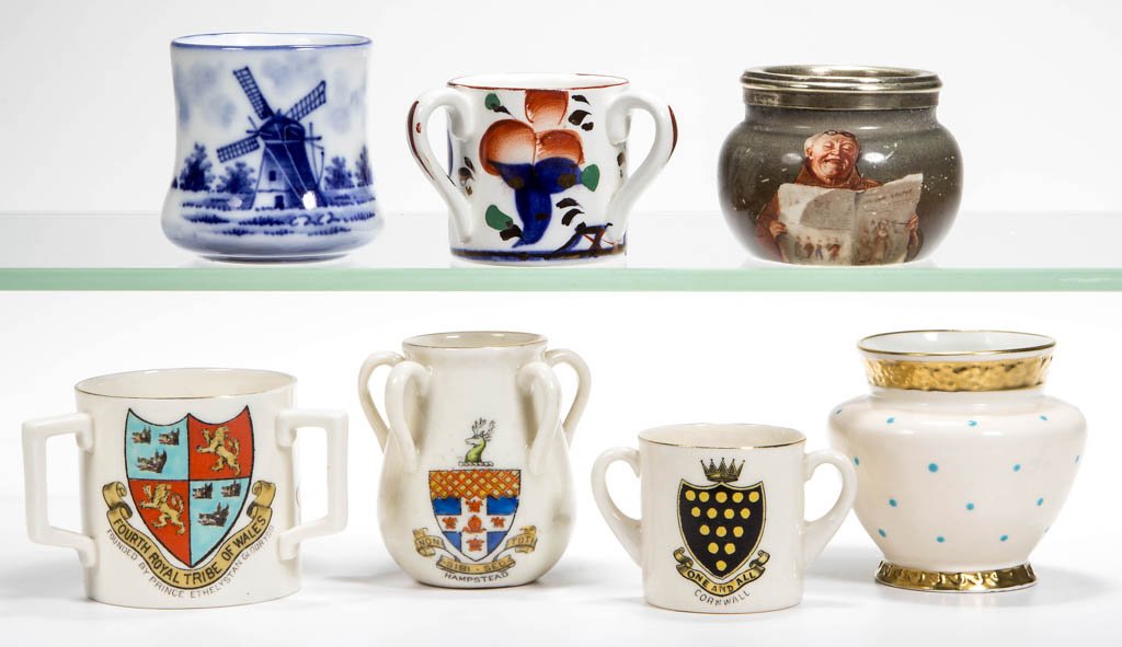 ASSORTED CERAMIC TOOTHPICK HOLDERS, LOT OF SEVEN: ASSORTED CERAMIC TOOTHPICK HOLDERS, LOT OF SEVEN, including Allertons Gaudy Welsh, Delft-style windmill, and an example with transfer monk decorations. Late 19th/first half 20th century. 1 5/8" to 2 1