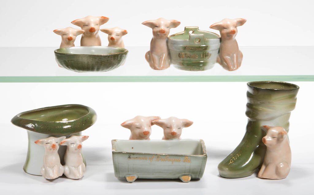 GERMAN PINK PIG FIGURAL CERAMIC TOOTHPICK / MATCH: GERMAN PINK PIG FIGURAL CERAMIC TOOTHPICK / MATCH HOLDERS, LOT OF FIVE, each with gilt souvenir lettering. First quarter 20th century. 1 3/4" to 3" H. Provenance: The Lowell Wiggins collection, Sun Ci