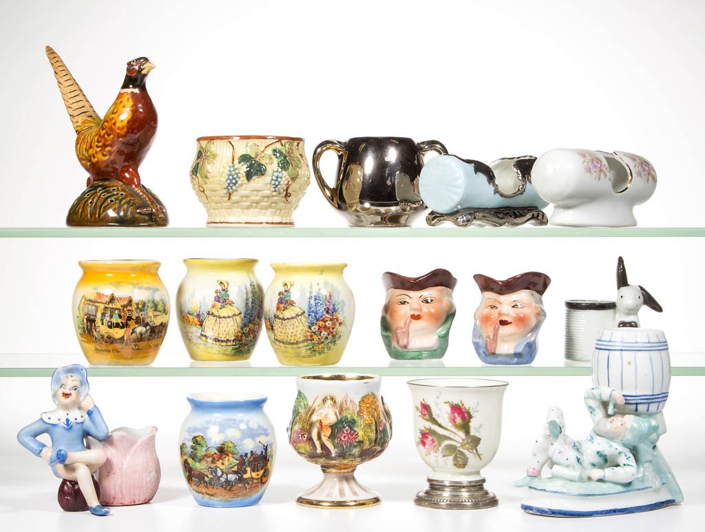 ASSORTED CONTINENTAL CERAMIC TOOTHPICK HOLDERS, LOT OF: ASSORTED CONTINENTAL CERAMIC TOOTHPICK HOLDERS, LOT OF 16, including two Dickens Days, Rosenthal Thorn Rose with sterling silver base, a Rosemead Pheasant, and Capodimonte example. 20th century. 2" to