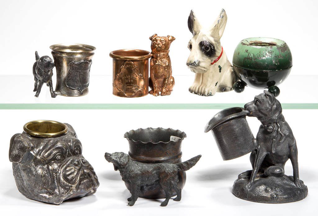 ASSORTED METAL FIGURAL DOG TOOTHPICK / MATCH HOLDERS,: ASSORTED METAL FIGURAL DOG TOOTHPICK / MATCH HOLDERS, LOT OF SIX, including a silver-plated Dog with Tophat and Bulldog Head with rear striker. Fourth quarter 19th/first quarter 20th century. 1 3/4" t