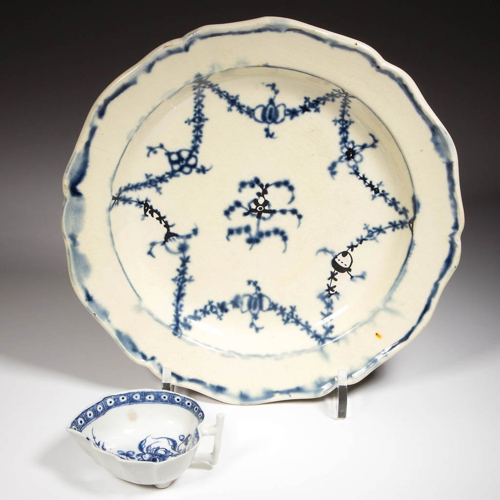 ENGLISH STAFFORDSHIRE PORCELAIN AND POTTERY WORCESTER: ENGLISH STAFFORDSHIRE PORCELAIN AND POTTERY WORCESTER BUTTER BOAT AND CREAMWARE PLATE, LOT OF TWO, the first of leaf-molded shape with foliate designs to underside, transfer-printed in "The Butter Boa