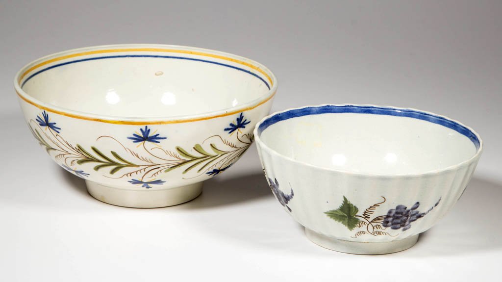 ENGLISH STAFFORDSHIRE POTTERY PEARLWARE BOWLS, LOT OF: ENGLISH STAFFORDSHIRE POTTERY PEARLWARE BOWLS, LOT OF TWO, comprising one of plain molding, with blue and yellow bands above a bold, lateral band of vining stylized flowers to the outside, centering a