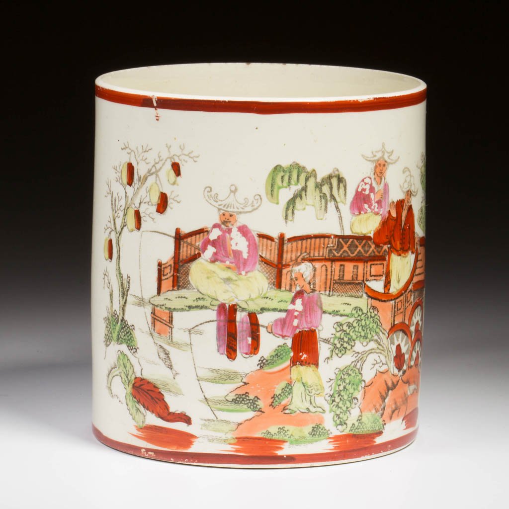 ENGLISH STAFFORDSHIRE POTTERY LARGE CREAMWARE MUG: ENGLISH STAFFORDSHIRE POTTERY LARGE CREAMWARE MUG, the straight-sided body with a simple C-form handle, painted with iron red bands to rim and foot, and stylized foliate designs on the handle and to e