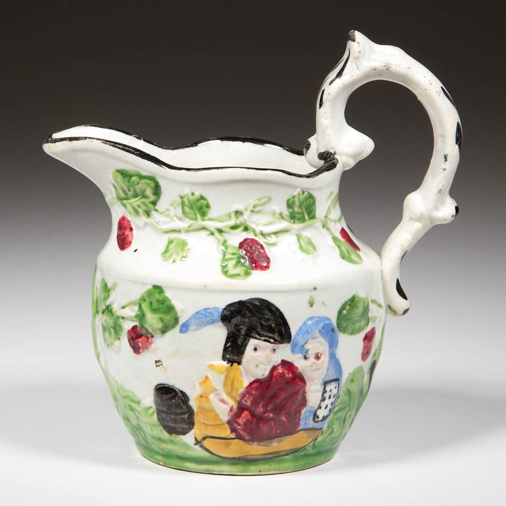 ENGLISH STAFFORDSHIRE POTTERY PEARLWARE PRATTWARE: ENGLISH STAFFORDSHIRE POTTERY PEARLWARE PRATTWARE MOLDED PITCHER, of baluster form with wavy rim, and wide C-scroll handle, the neck molded in low relief with strawberries and leaves on the vine, over