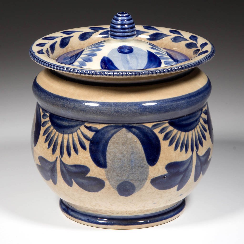 ENGLISH STAFFORDSHIRE POTTERY PEARLWARE MOLDED SUGAR: ENGLISH STAFFORDSHIRE POTTERY PEARLWARE MOLDED SUGAR BOWL AND COVER, the body with beaded edge to the high collar enclosing the inset low-domed cover with beehive knop, painted with light blue and dar