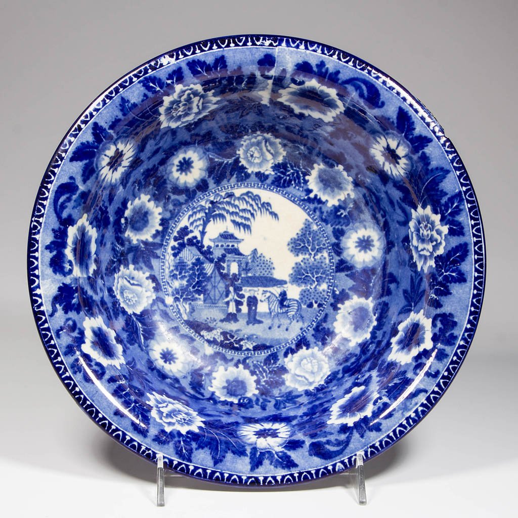 ENGLISH JOHN ROGERS & SON POTTERY PEARLWARE "ZEBRA #1": ENGLISH JOHN ROGERS & SON POTTERY PEARLWARE "ZEBRA #1" PATTERN BASIN, the body with everted rim with tapering sides over a white foot, transfer-printed to side exteriors and interior with a large flor