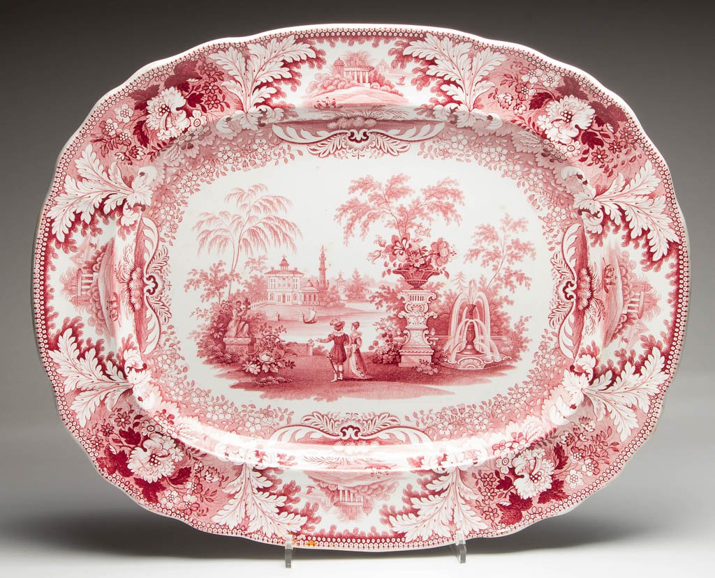 ENGLISH STAFFORDSHIRE POTTERY PEARLWARE PRINTED PLATTER: ENGLISH STAFFORDSHIRE POTTERY PEARLWARE PRINTED PLATTER, red transfer-printed, the scalloped edge printed with an oak-leaf and foliate border, centering a Palladian landscape in reserves, centering a