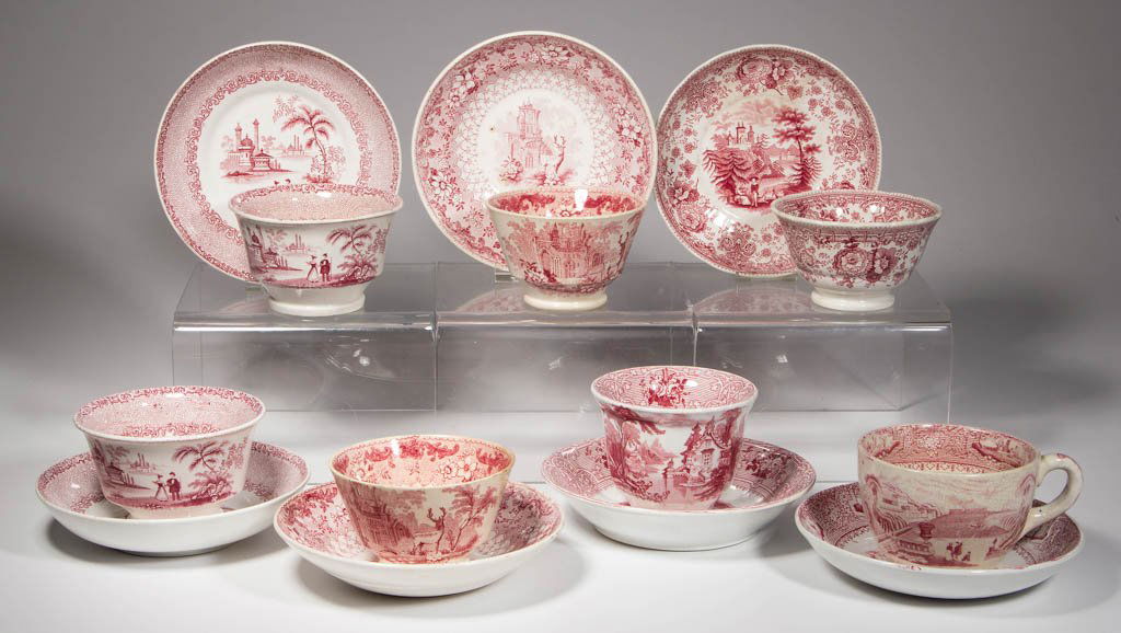 ENGLISH STAFFORDSHIRE POTTERY ROMANTIC TRANSFER TABLE: ENGLISH STAFFORDSHIRE POTTERY ROMANTIC TRANSFER TABLE ARTICLES, LOT OF 14, transfer-printed in red, comprising six tea bowls and saucers and a teacup and saucer, all by various makers, and in various